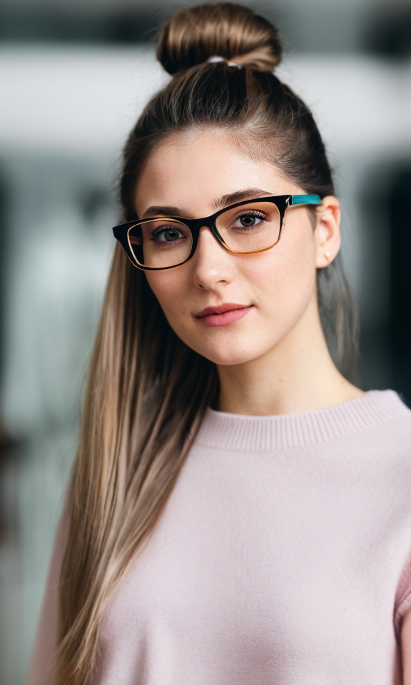 06289-3396701979-close up, of of british woman, pale, messy bun, wearing glasses with a ponytail, (high detailed skin_1.2), film grain, Fujifilm.jpg