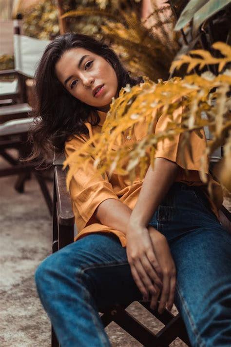 person leaning back in chair